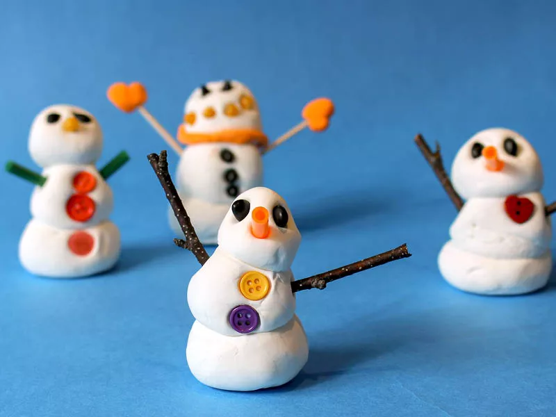 Snow people made of white clay